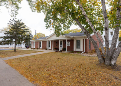 Stanek Dental exterior photo - brick building with white trim